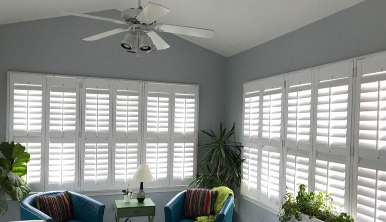 Clearwater living room with fan and shutters